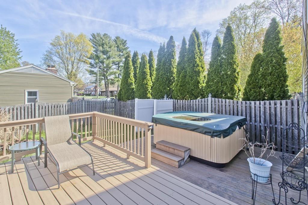 38 Pine Acre Road Springfield, MA 01129 - Photo 31 of 40 a view of a deck with furniture and wooden floor