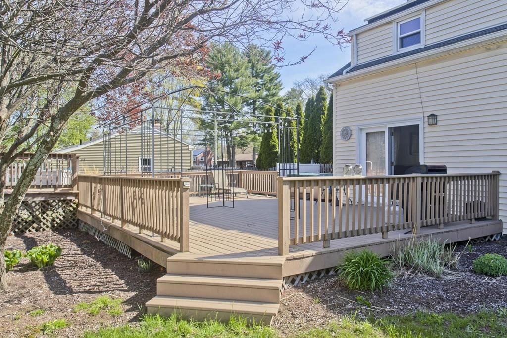 38 Pine Acre Road Springfield, MA 01129 - Photo 36 of 40 a view of a wooden deck and a yard