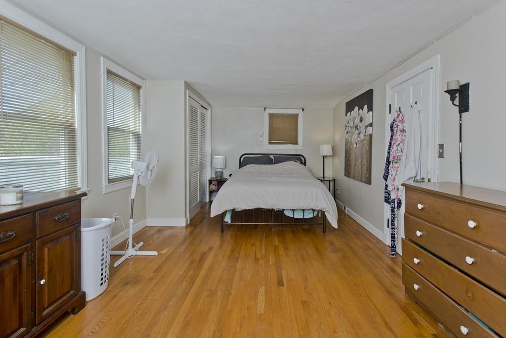 38 Pine Acre Road Springfield, MA 01129 - Photo 5 of 40 a spacious bedroom with a bed and a dresser