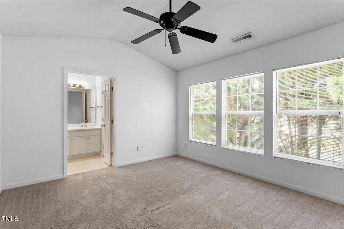 8511 Bright Loop Raleigh, NC 27613 - Photo 20 of 44 Primary Suite