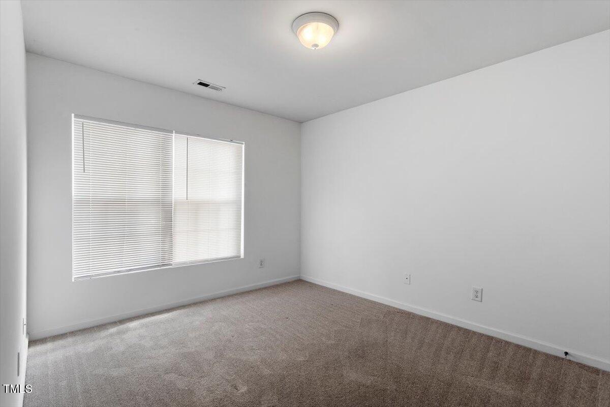 8511 Bright Loop Raleigh, NC 27613 - Photo 28 of 44 2nd Bedroom