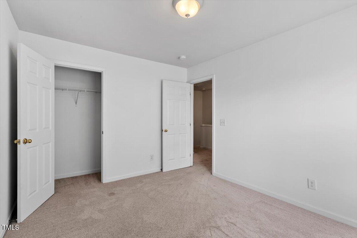 8511 Bright Loop Raleigh, NC 27613 - Photo 29 of 44 2nd Bedroom
