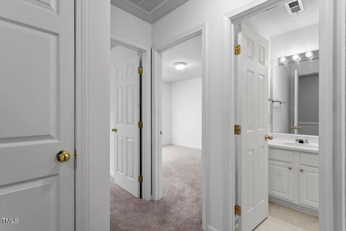 8511 Bright Loop Raleigh, NC 27613 - Photo 30 of 44 2nd Floor Hall