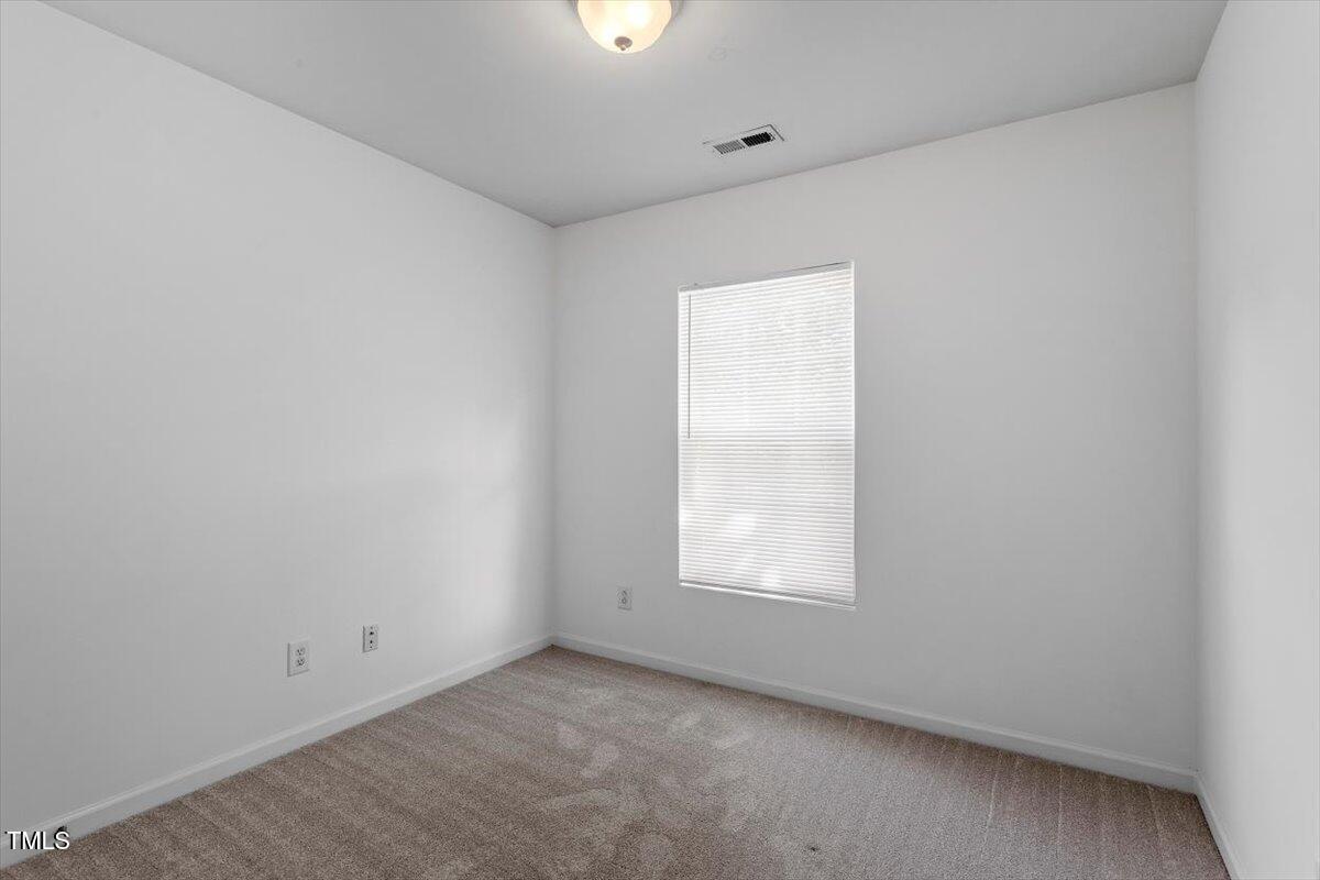 8511 Bright Loop Raleigh, NC 27613 - Photo 32 of 44 3rd Bedroom