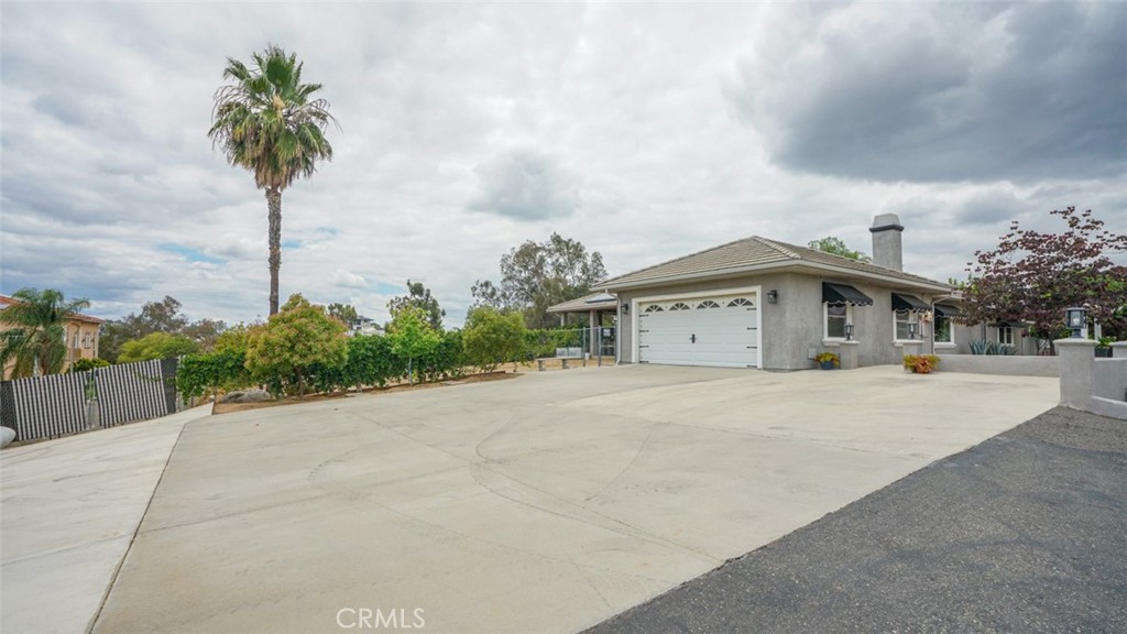 16025 Perry Heights Drive Riverside, CA 92504 - Photo 12 of 105 Front of Home Side Angle /Garage