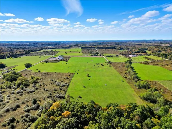 a view of a lake with a building in the background