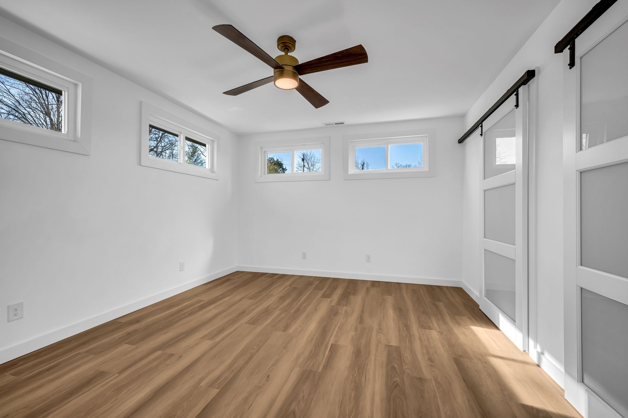 1033 Pine Valley Road Kingston Springs, TN 37082 - Photo 12 of 42 a view of room with wooden floor and ceiling fan