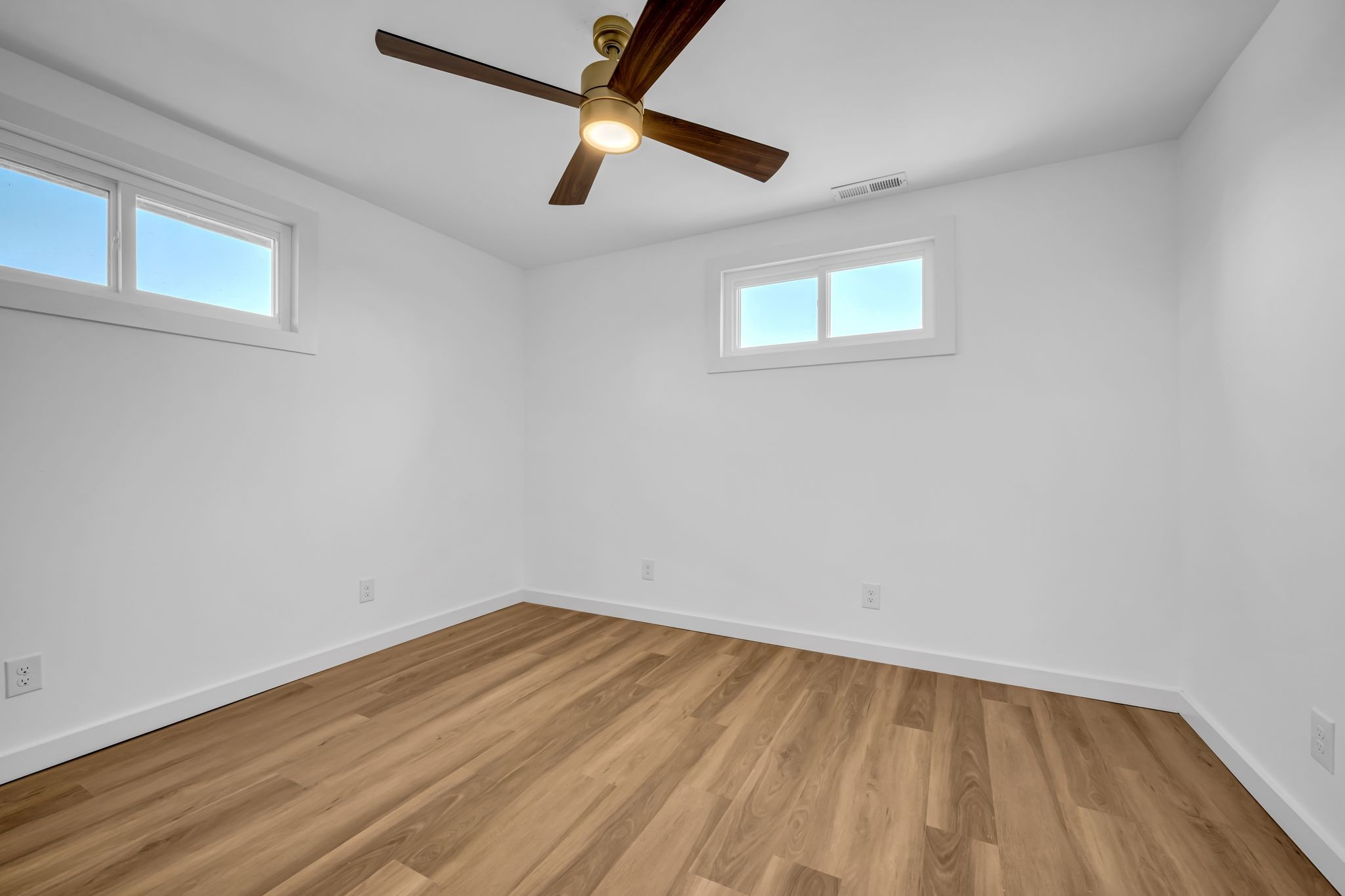 1033 Pine Valley Road Kingston Springs, TN 37082 - Photo 19 of 42 an empty room with a window and a ceiling fan