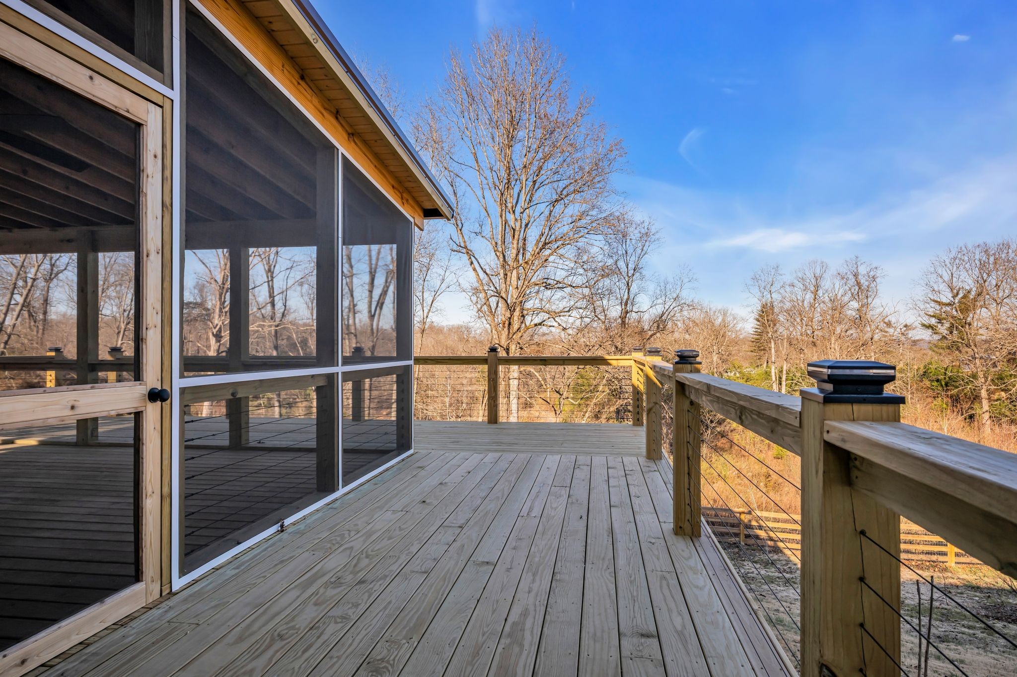1033 Pine Valley Road Kingston Springs, TN 37082 - Photo 23 of 42 a view of a balcony with wooden floor