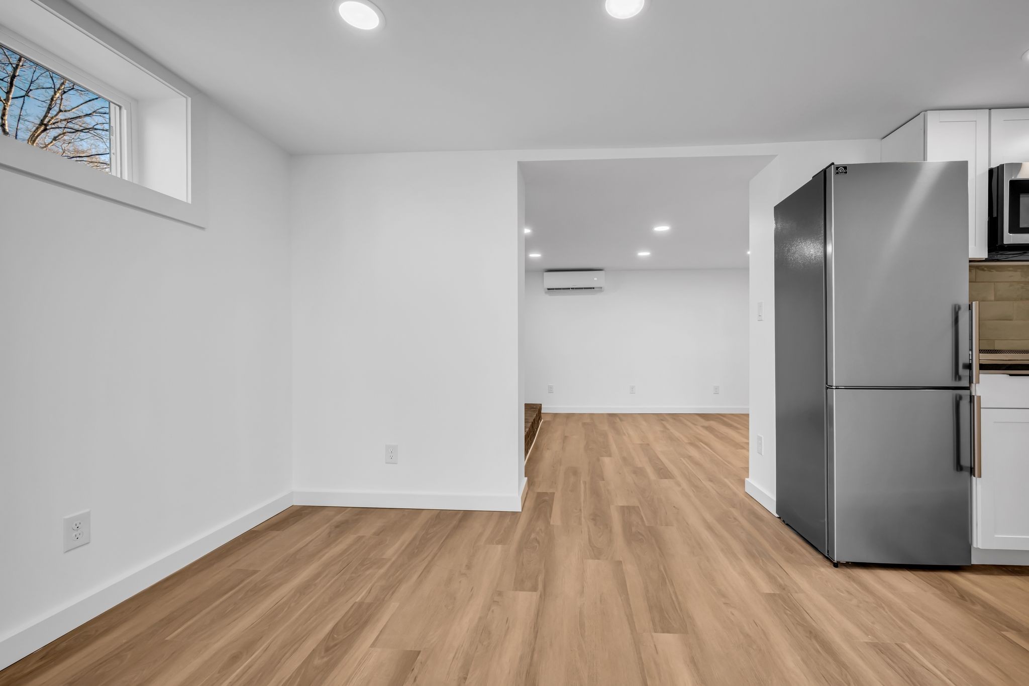 1033 Pine Valley Road Kingston Springs, TN 37082 - Photo 27 of 42 a view of a refrigerator in kitchen and wooden floor