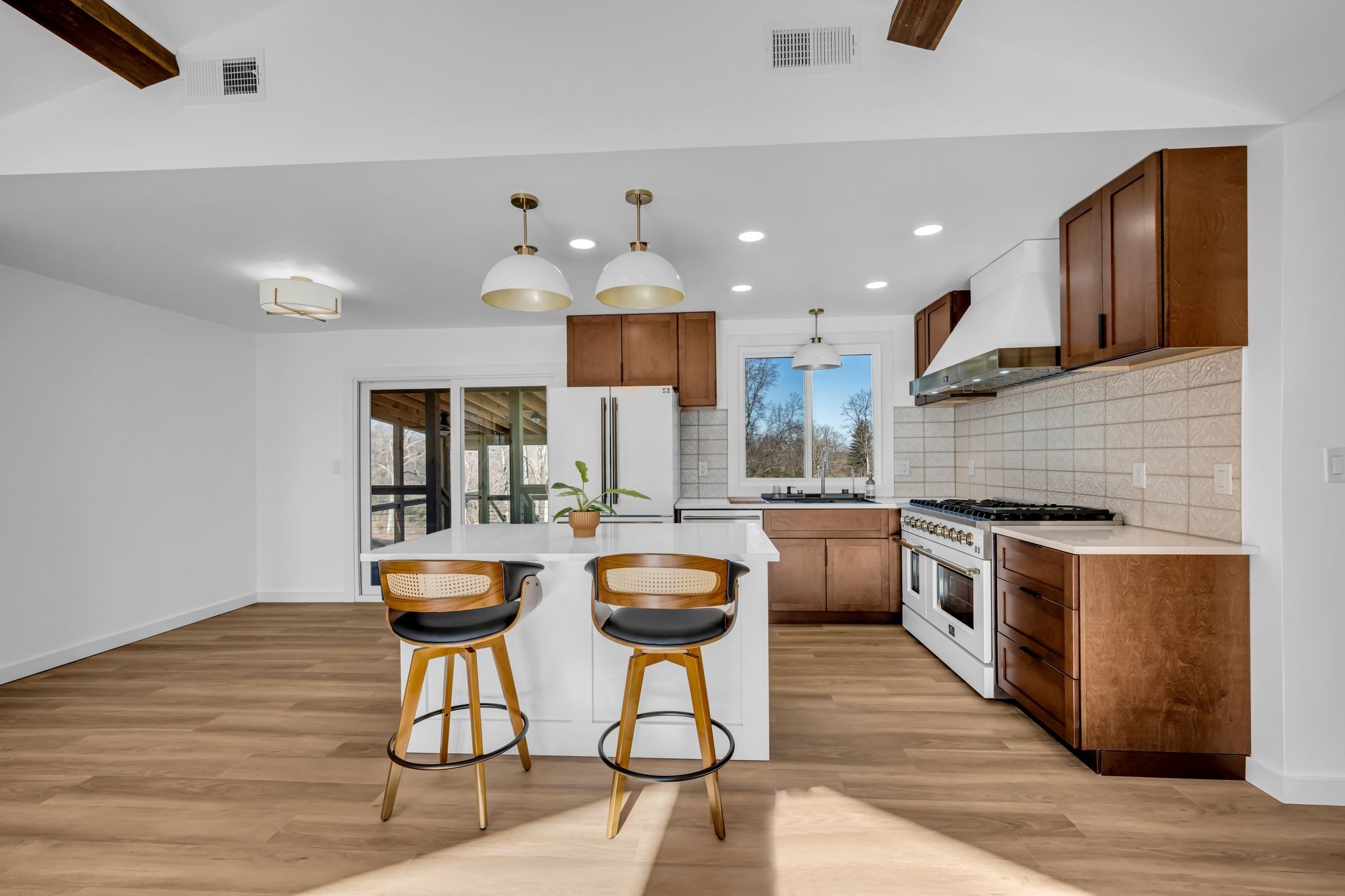 1033 Pine Valley Road Kingston Springs, TN 37082 - Photo 5 of 42 a kitchen with stainless steel appliances granite countertop a stove a sink and a refrigerator