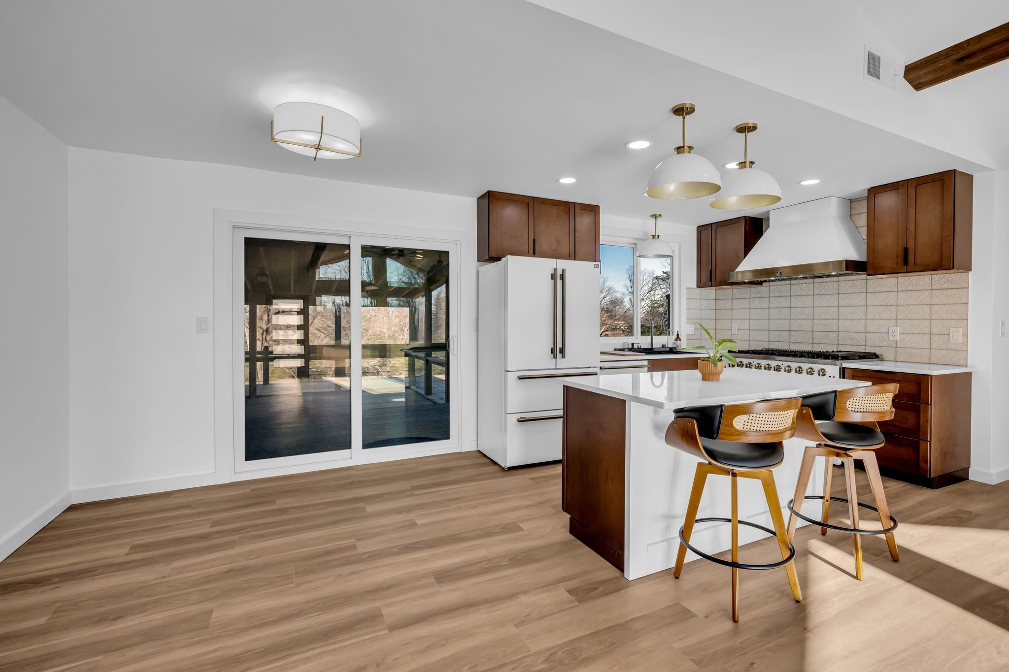 1033 Pine Valley Road Kingston Springs, TN 37082 - Photo 8 of 42 a kitchen with stainless steel appliances kitchen island granite countertop a refrigerator and a stove top oven