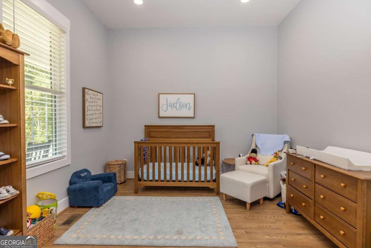 988 Boozer Road Heflin, AL 36264 - Photo 19 of 52 a bedroom with a bed and a window