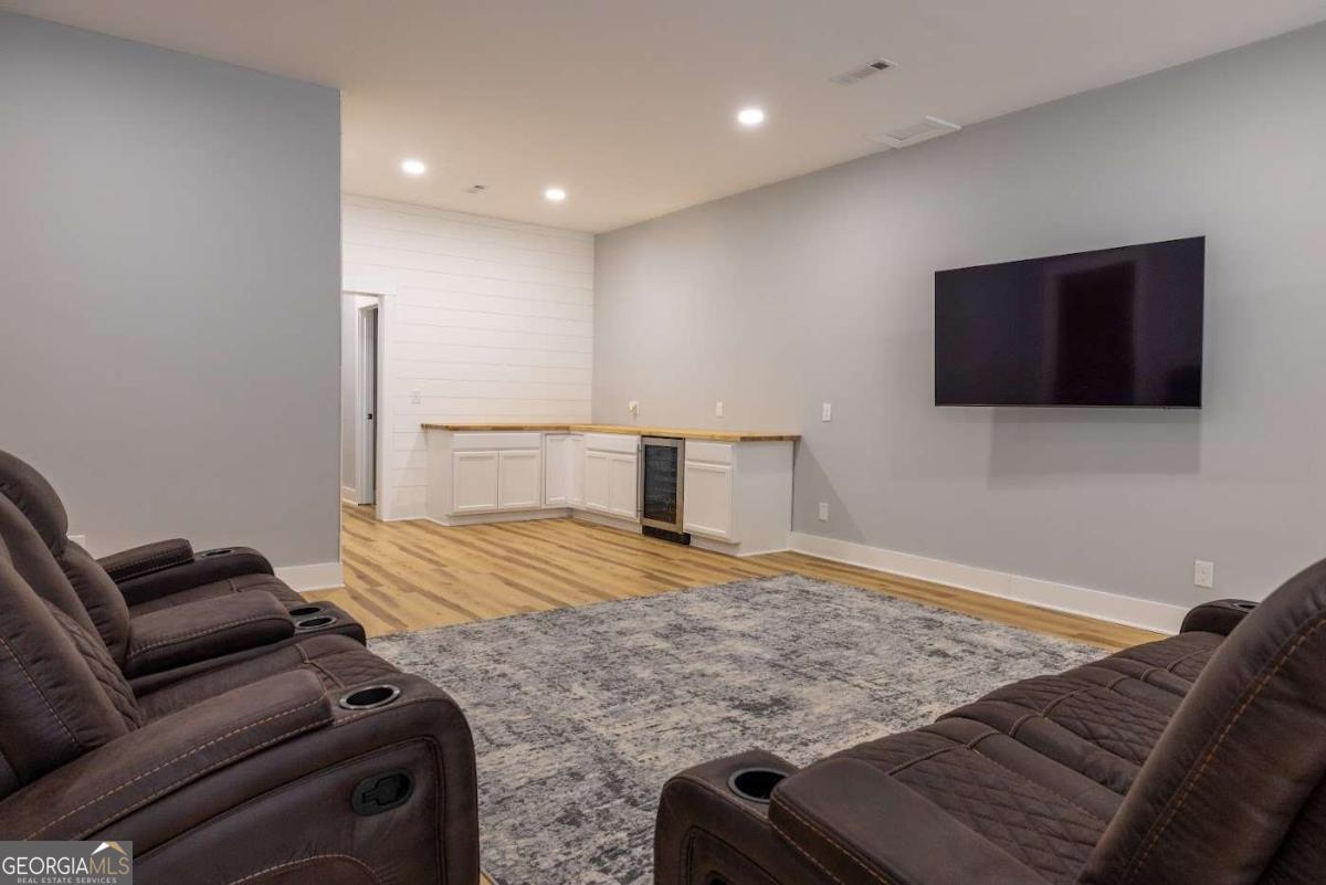 988 Boozer Road Heflin, AL 36264 - Photo 31 of 52 a bedroom with a bed and a television