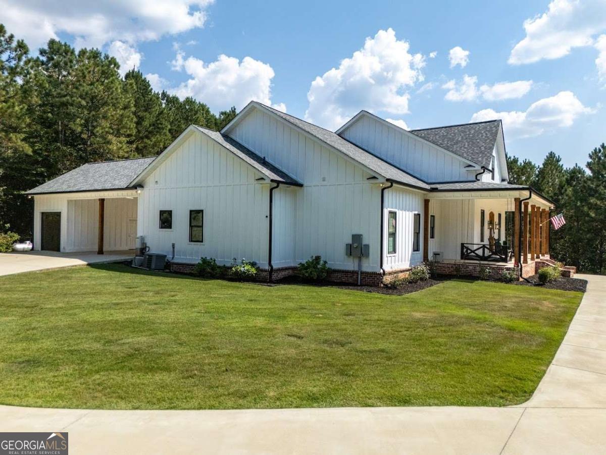 988 Boozer Road Heflin, AL 36264 - Photo 39 of 52 a view of a house with a yard