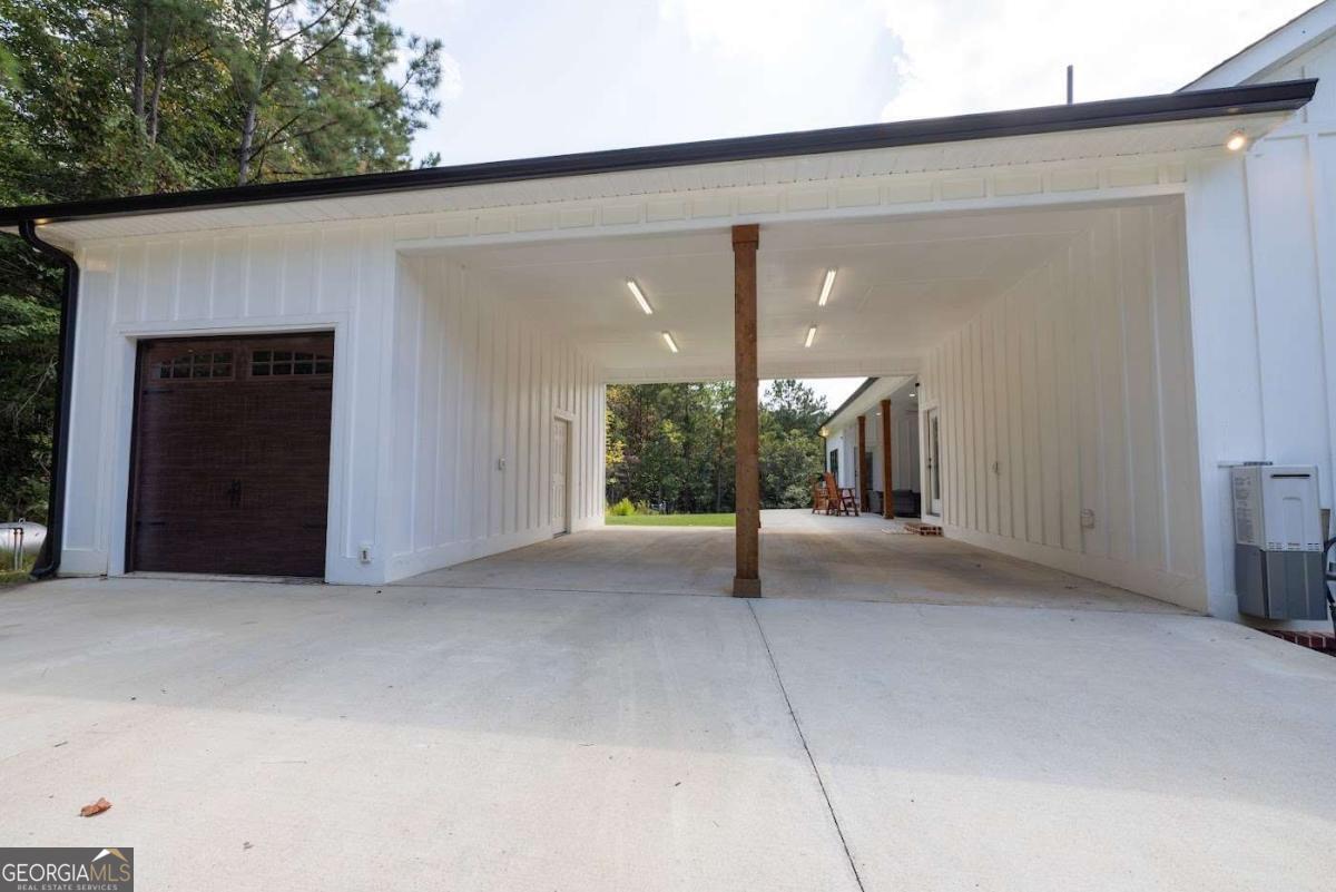 988 Boozer Road Heflin, AL 36264 - Photo 40 of 52 an empty room with a fireplace