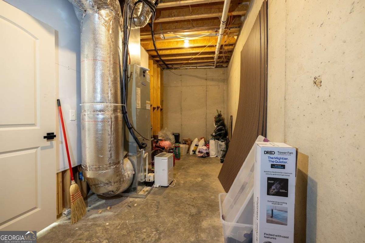 988 Boozer Road Heflin, AL 36264 - Photo 49 of 52 a view of an entryway with hardwood