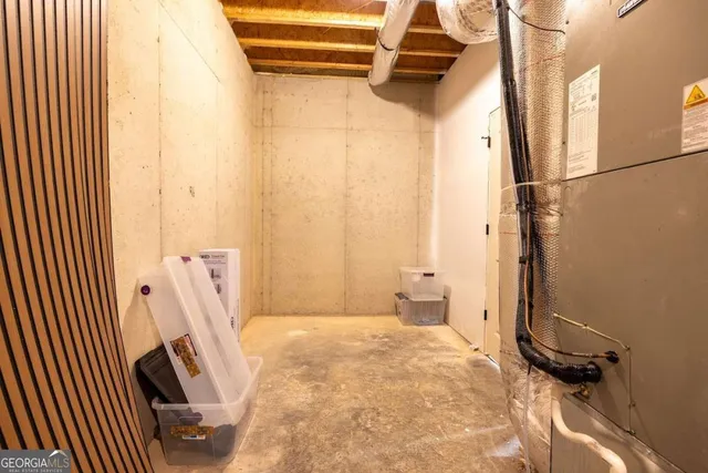 a view of a room with wooden walls