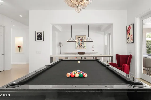 a bath tub sitting in a bathroom next to a window