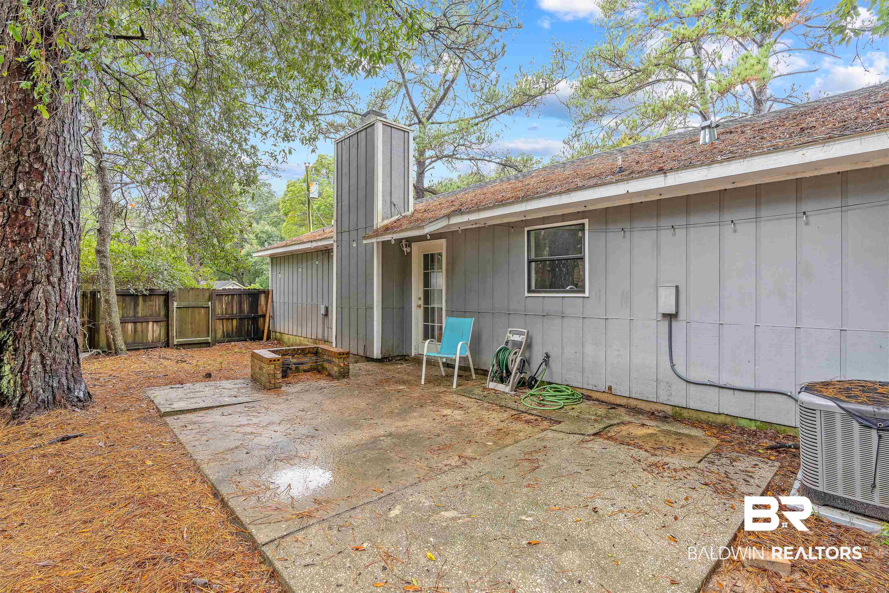 159 Montclair Loop Daphne, AL 36526 - Photo 16 of 18 Rear view of property with a patio