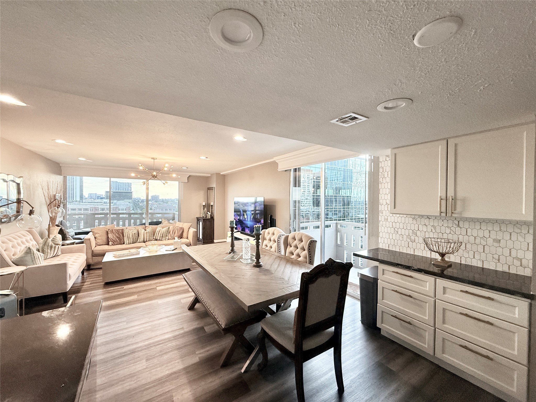2016 Main Street, Unit 1022 Houston, TX 77002 - Photo 3 of 48 a view of a dining room with furniture window and wooden floor