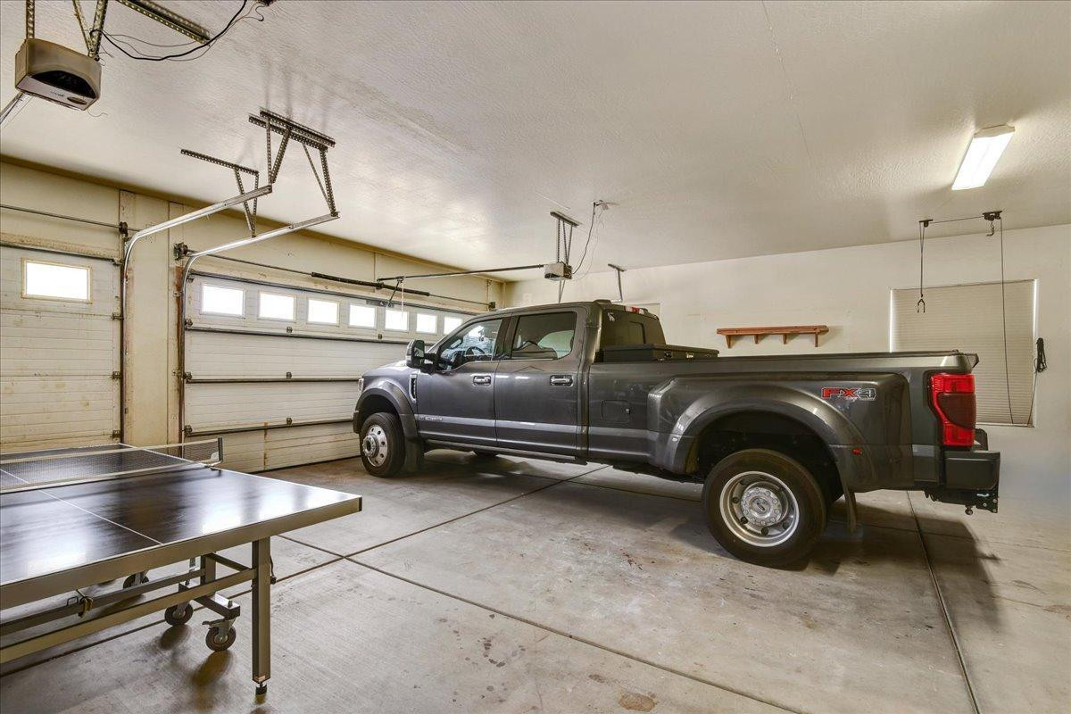 412 East Yearling Road Phoenix, AZ 85085 - Photo 30 of 51 a view of a car in garage
