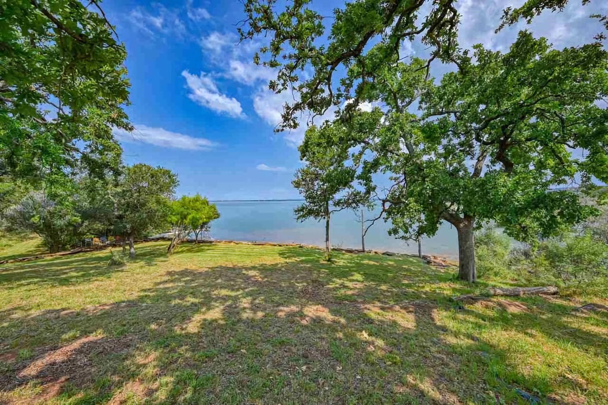 3315 Sunset Cliff Road Burnet, TX 78611 - Photo 4 of 9 a big yard with lots of green space