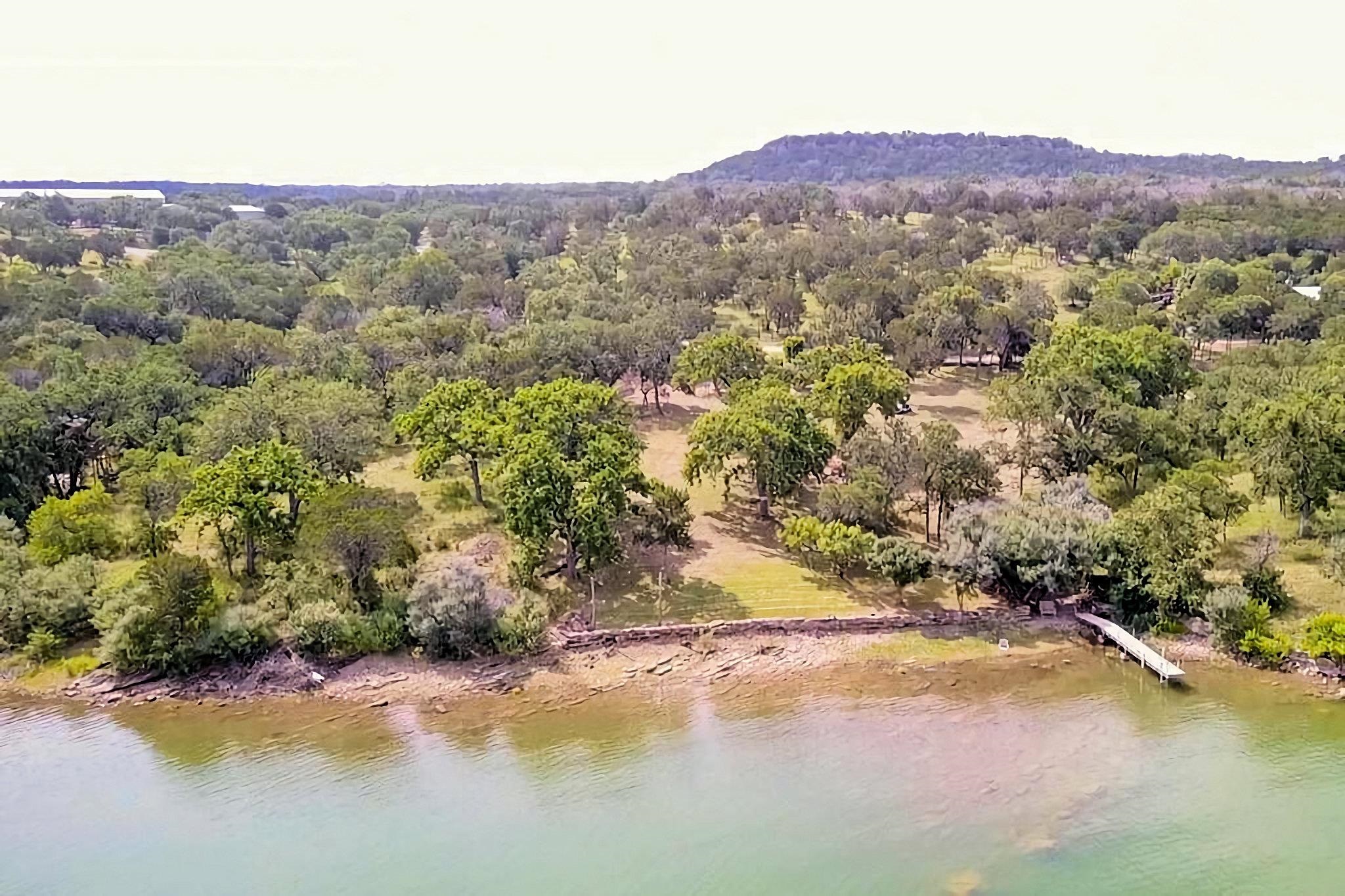 3315 Sunset Cliff Road Burnet, TX 78611 - Photo 6 of 9 a view of a city with mountains in the background
