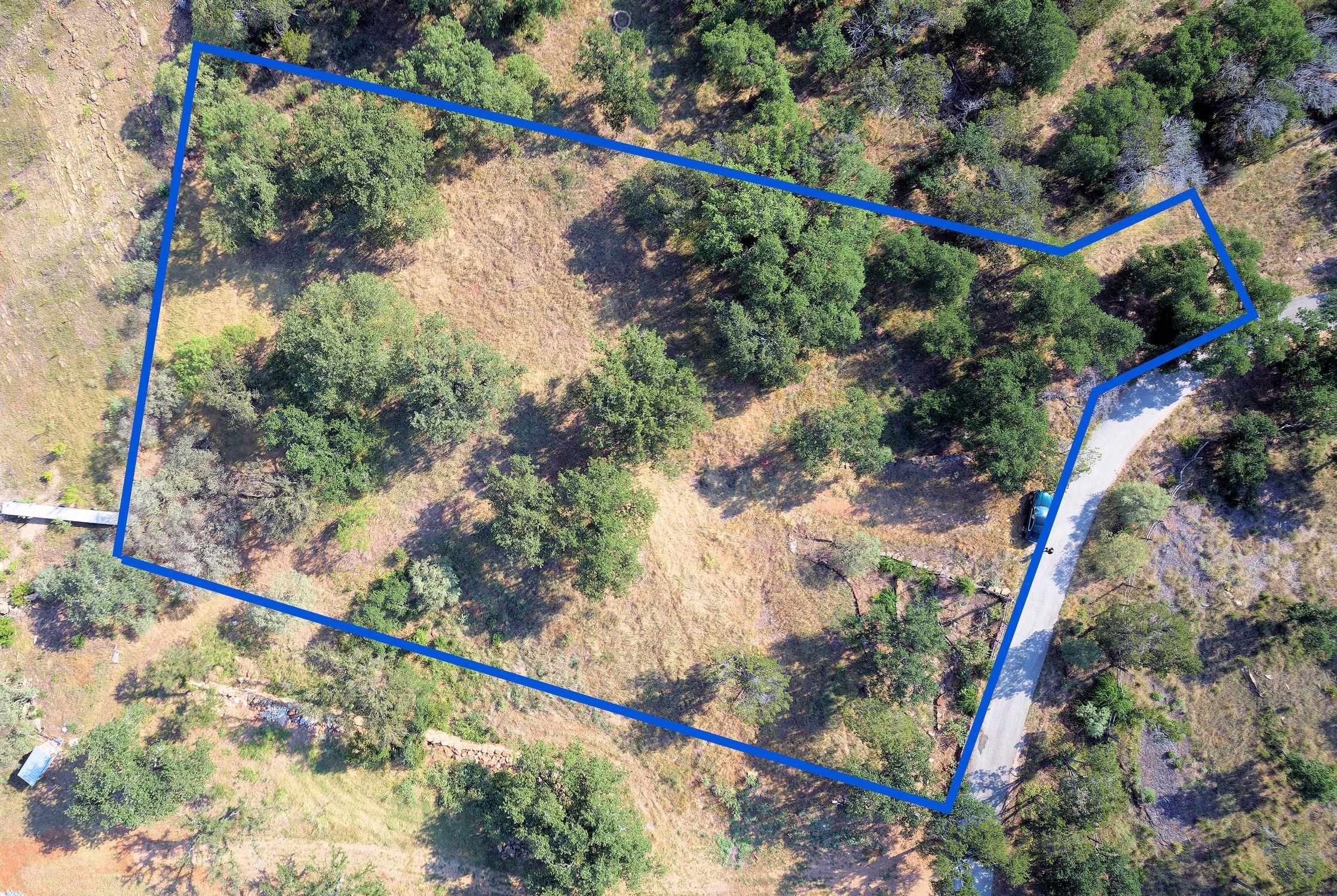 3315 Sunset Cliff Road Burnet, TX 78611 - Photo 8 of 9 a city view with a palm and plants