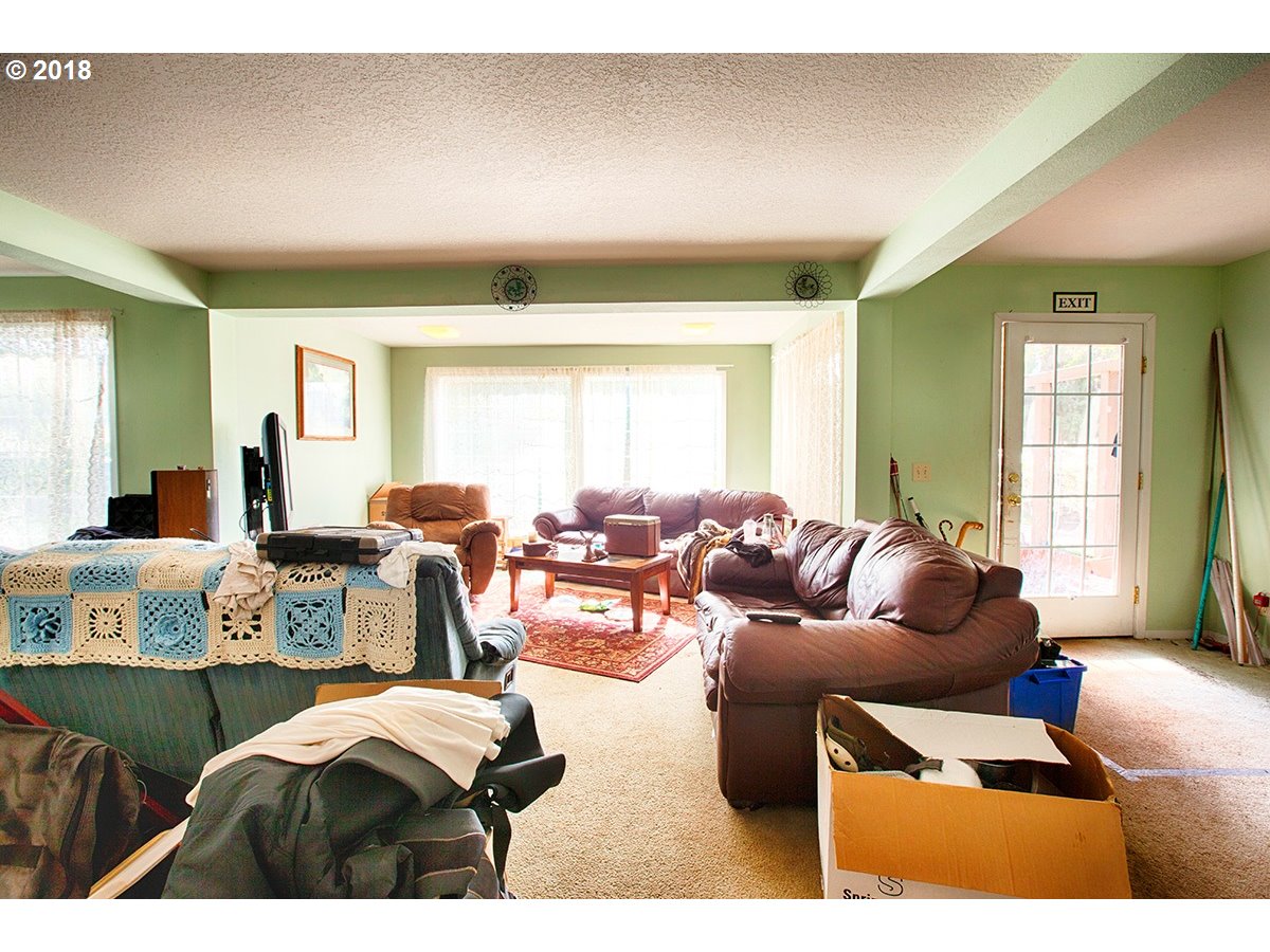 21953 South Redland Road Estacada, OR 97023 - Photo 13 of 25 a living room with furniture and a large window