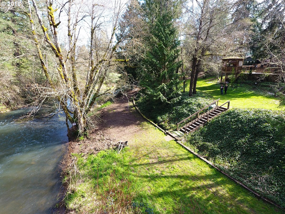 21953 South Redland Road Estacada, OR 97023 - Photo 3 of 25 a backyard of a house with lots of green space