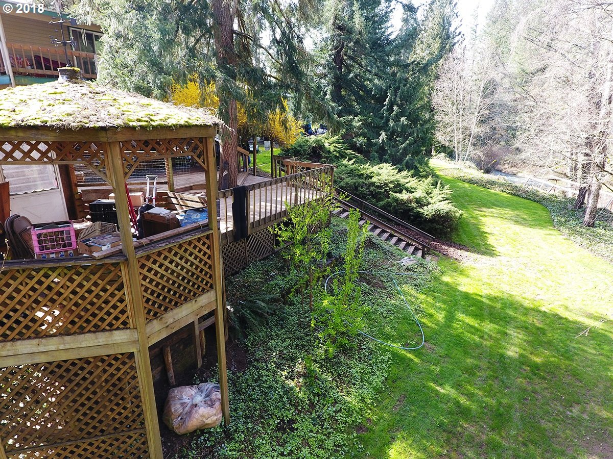21953 South Redland Road Estacada, OR 97023 - Photo 9 of 25 a view of a dinning table and chairs in patio