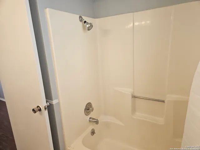 a bathroom with a tub
