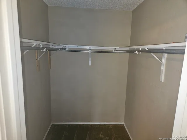 a view of small space with racks on the wall