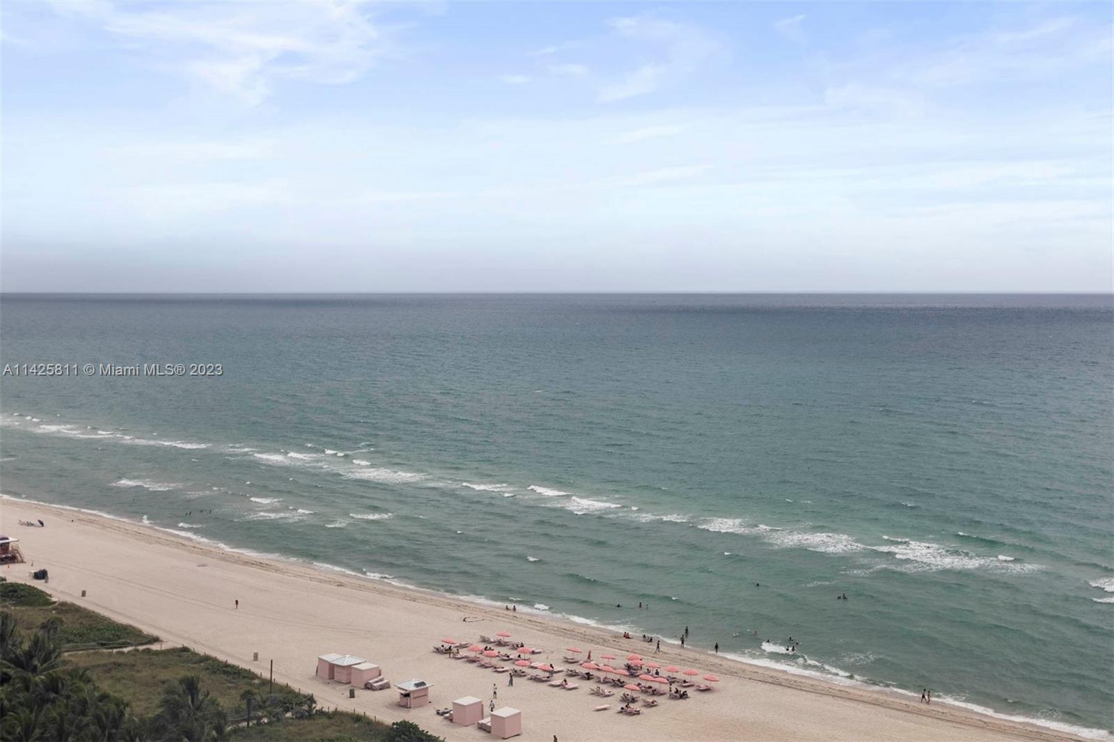 4779 Collins Avenue, Unit 1908 Miami Beach, FL 33140 - Photo 20 of 36 a view of beach and ocean