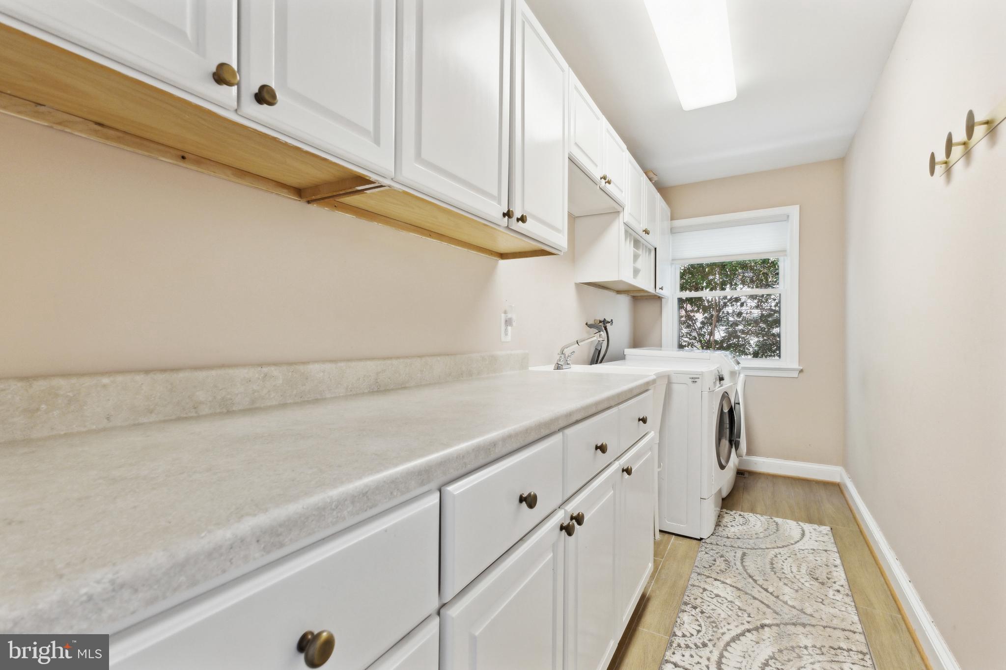 1865 Post Oak Trail Reston, VA 20191 - Photo 18 of 39 Deep laundry room with lots of storage