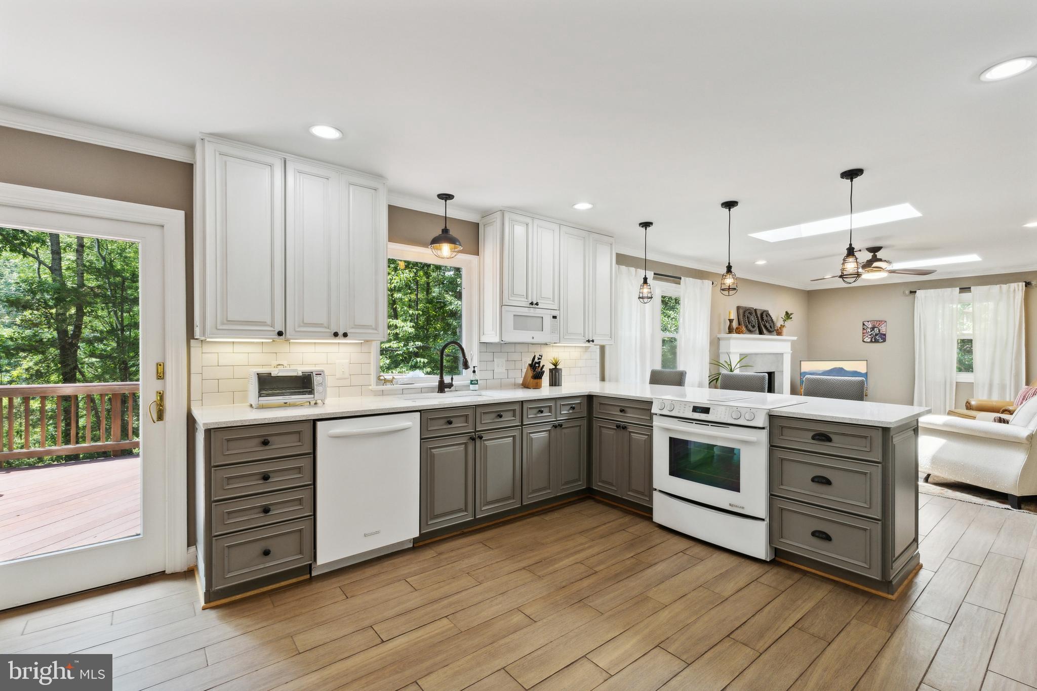 1865 Post Oak Trail Reston, VA 20191 - Photo 6 of 39 Remodeled open Kitchen with ample counters