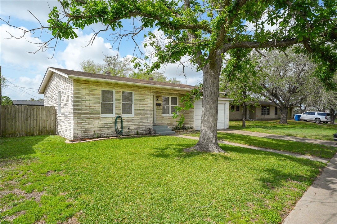 804 Edwards Street Sinton, TX 78387 - Photo 2 of 25 a view of a house with a yard