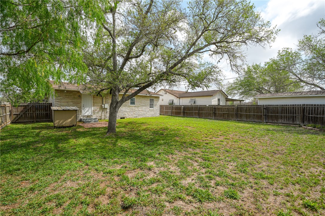 804 Edwards Street Sinton, TX 78387 - Photo 23 of 25 a front view of house with a garden
