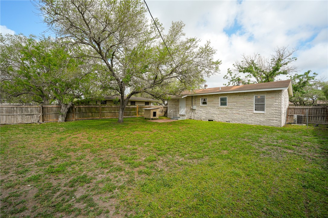 804 Edwards Street Sinton, TX 78387 - Photo 24 of 25 a view of a house with a yard