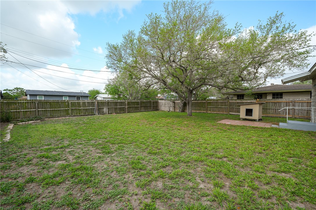 804 Edwards Street Sinton, TX 78387 - Photo 25 of 25 a view of a yard with a house