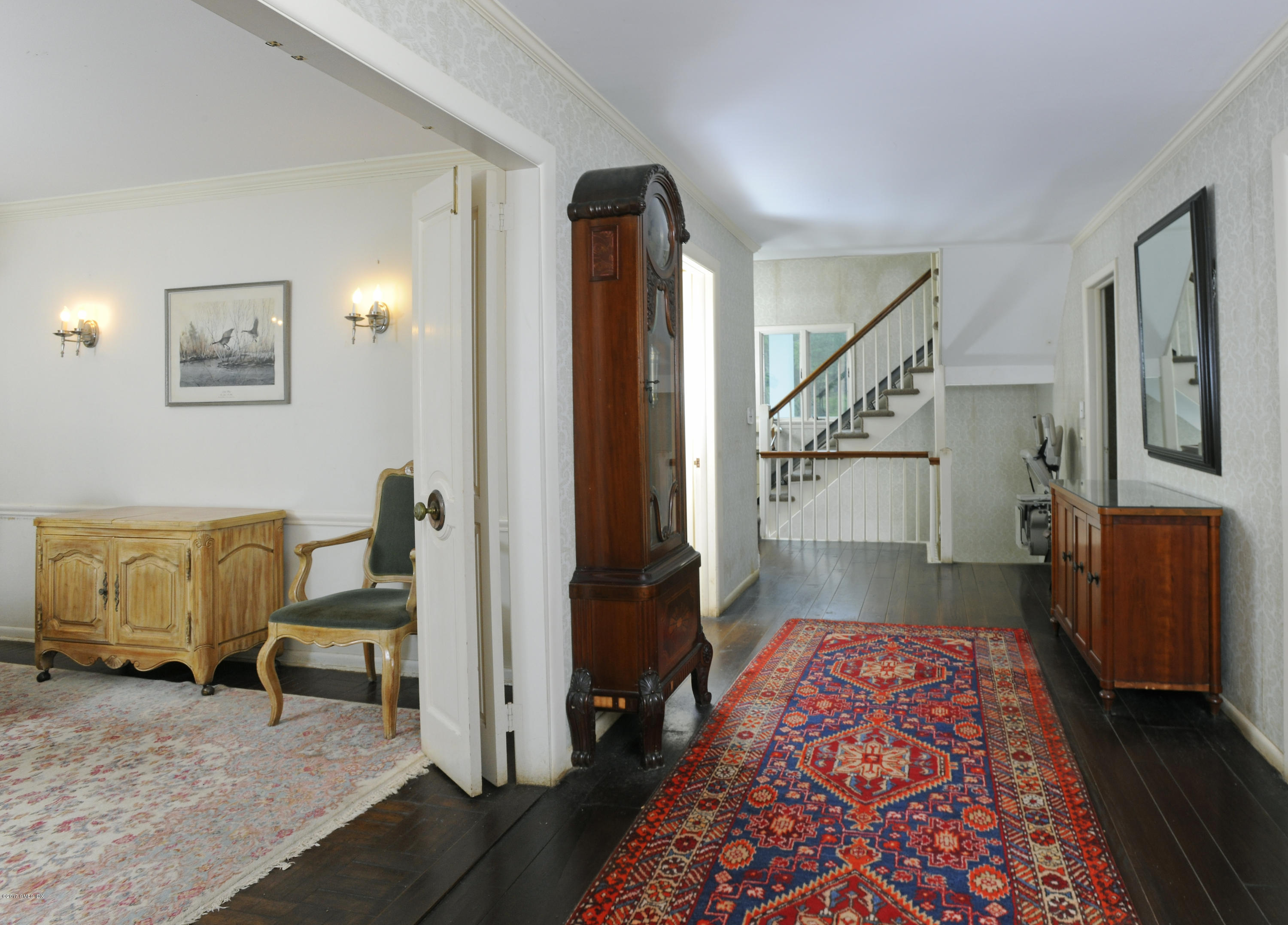 2 Hunting Ridge Road Greenwich, CT 06831 - Photo 3 of 14 a living room with furniture and a rug
