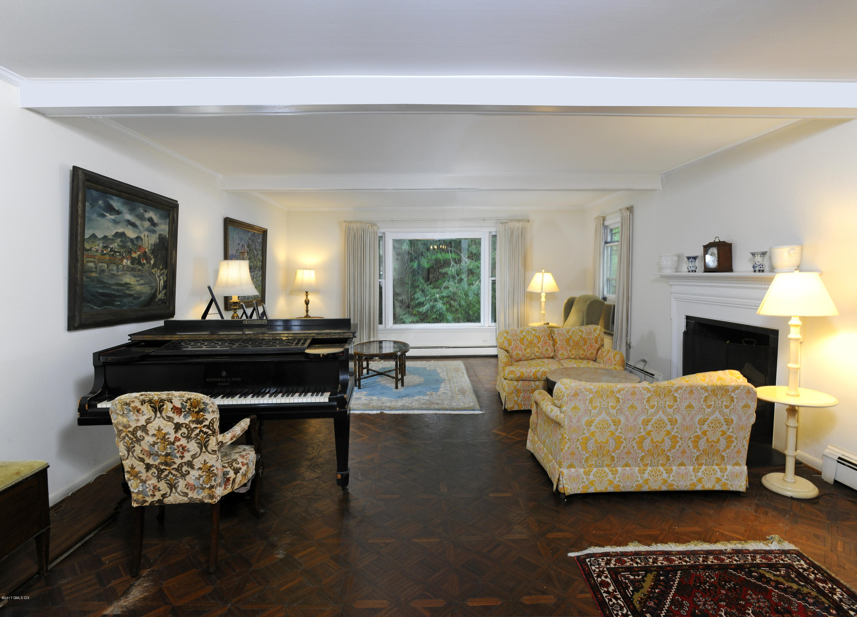 2 Hunting Ridge Road Greenwich, CT 06831 - Photo 4 of 14 a living room with furniture and a fireplace