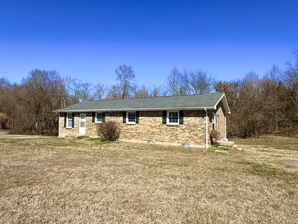 a front view of house with yard