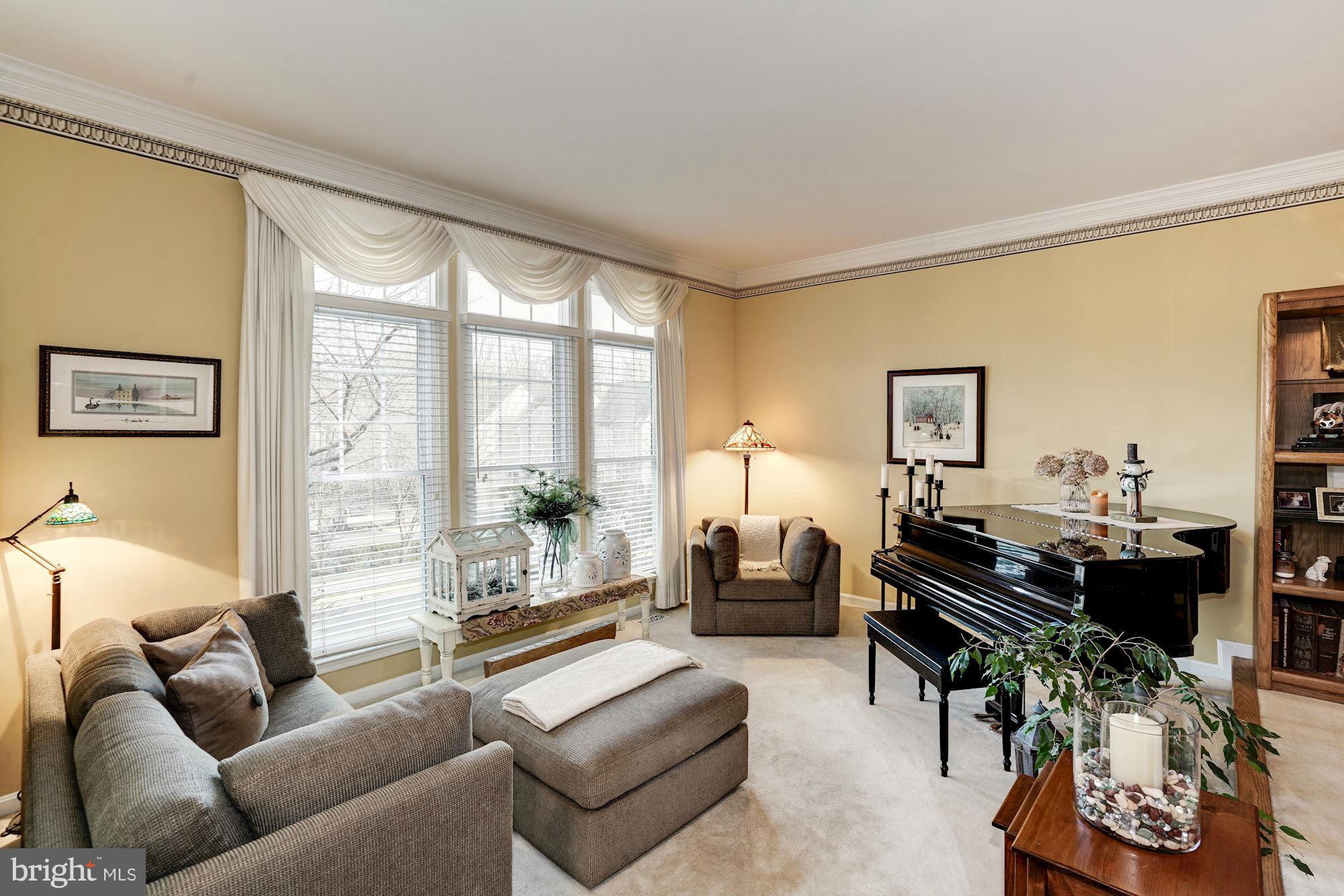 1256 Weatherstone Court Reston, VA 20194 - Photo 3 of 30 a living room with furniture and a large window