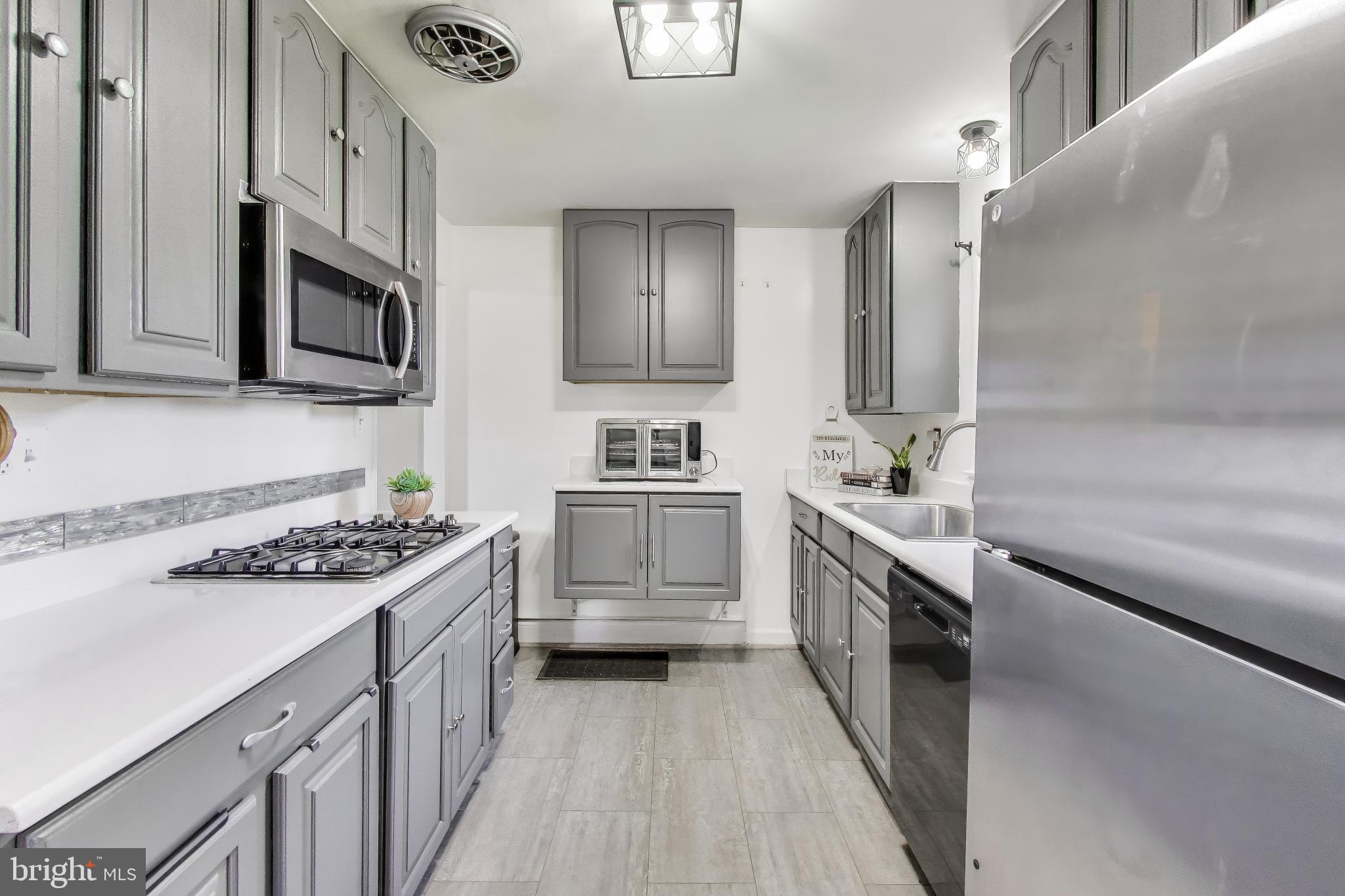 1304 Columbia Road Woodbridge, VA 22191 - Photo 12 of 50 Modern kitchen with sleek finishes.