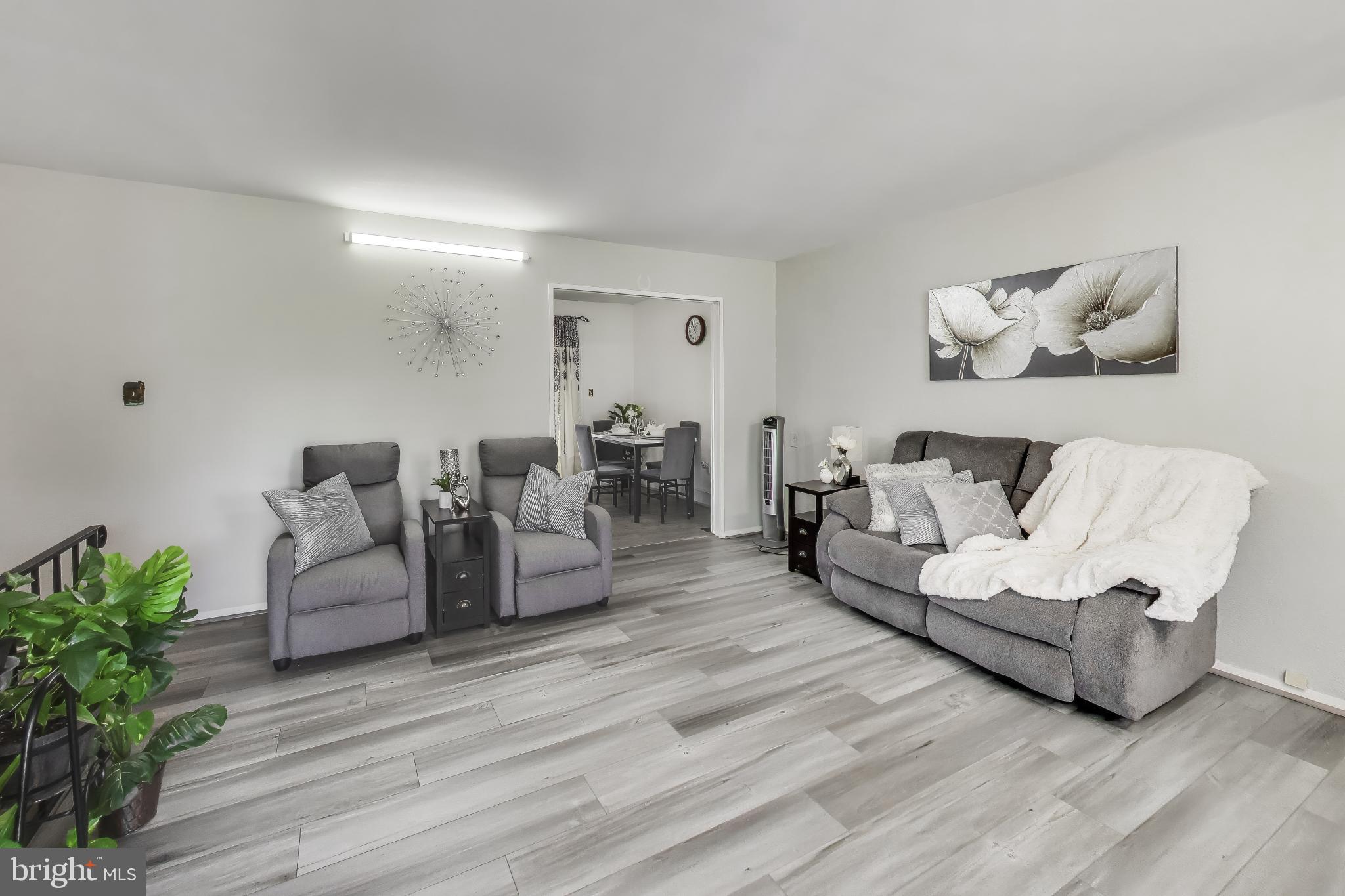1304 Columbia Road Woodbridge, VA 22191 - Photo 7 of 50 Spacious living area with modern charm.