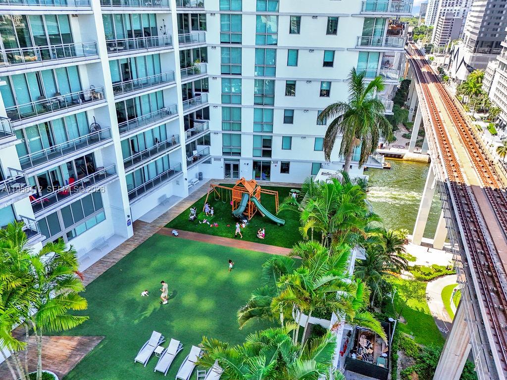 92 Southwest 3rd Street, Unit 4806 Miami, FL 33130 - Photo 16 of 20 a view of building with yard