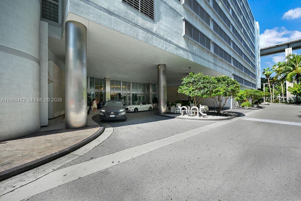 92 Southwest 3rd Street, Unit 4806 Miami, FL 33130 - Photo 20 of 20 a building with trees in front of it