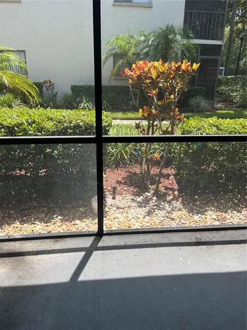 a view of swimming pool from a window